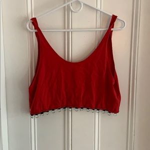 Red tank with chain link detail